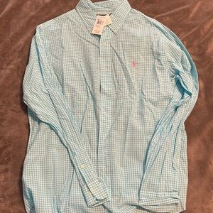 Selling a brand new with tags Ralph Lauren long sleeve button down shirt.